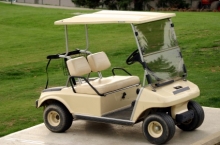 Photo d'voiturette de golf cart beige à vendre