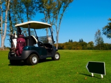 Photo d'une voiturette de golf cart verte